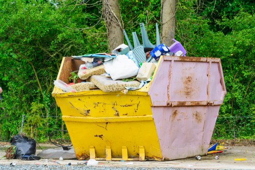 Professional team clearing a cluttered garage