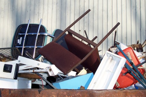 Eco-friendly trash removal vehicles operating in Burwood